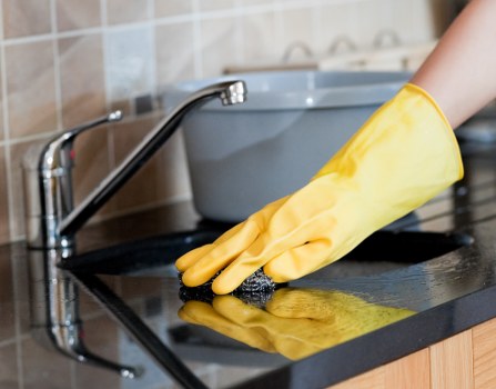 Carpet cleaning professional preparing equipment for a service appointment